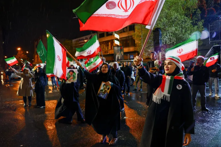 2026-03-26T175135Z_1522473465_RC2GCKAOAQOL_RTRMADP_3_IRAN-CRISIS-RALLY-1774584487 (1)